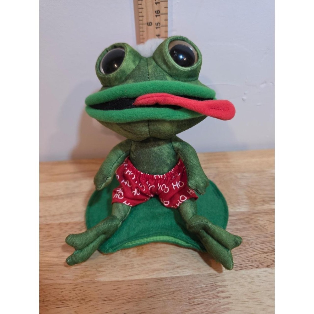 vintage American Greetings Santa Frog plush sitting on a green felt lily pad